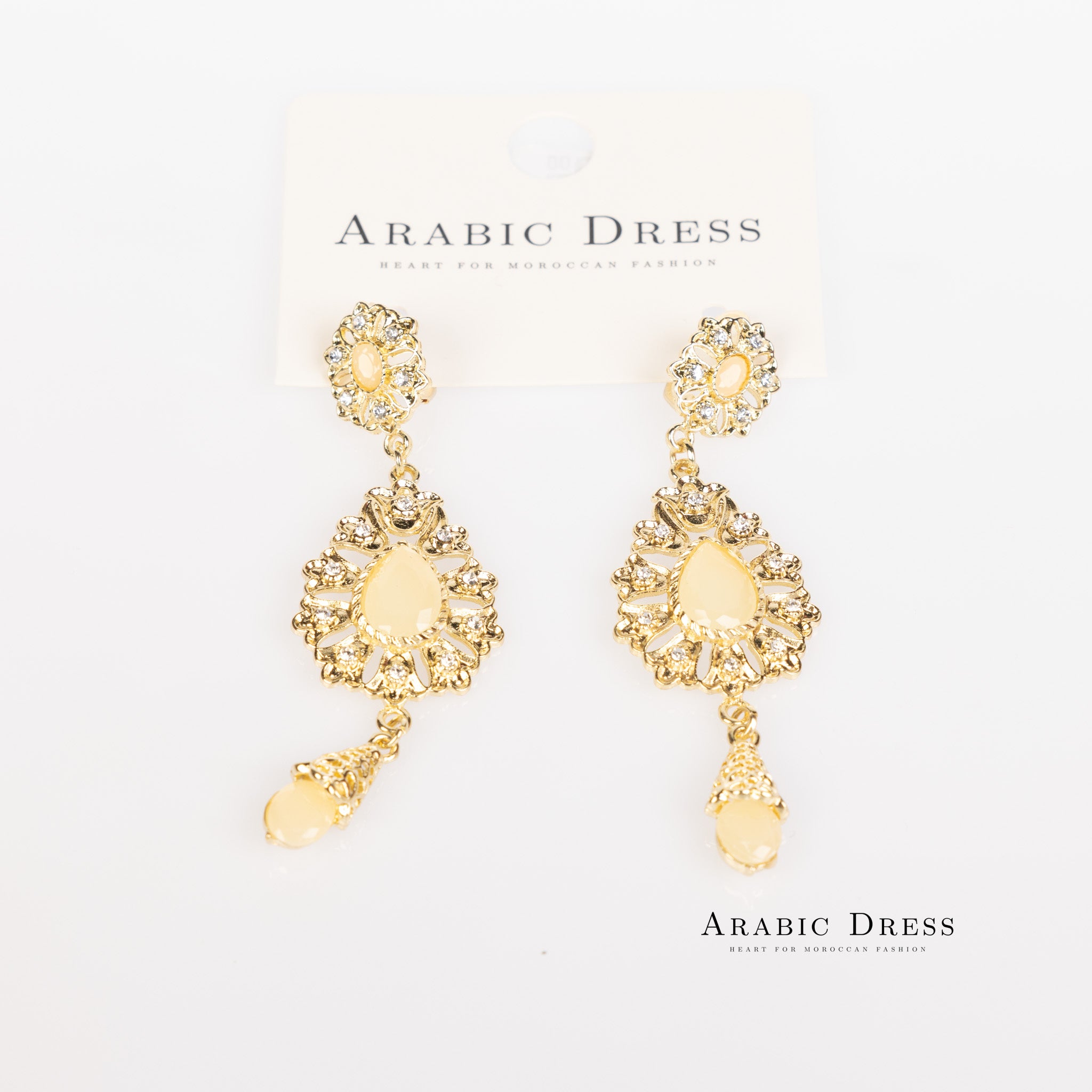 Creme Ara Earrings
